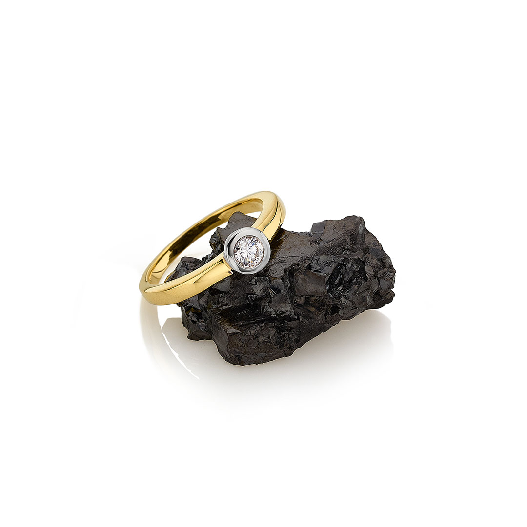 Solitaire-/Antragsring 585/- Gelbgold/Weißgold Brillant 0,05 ct.