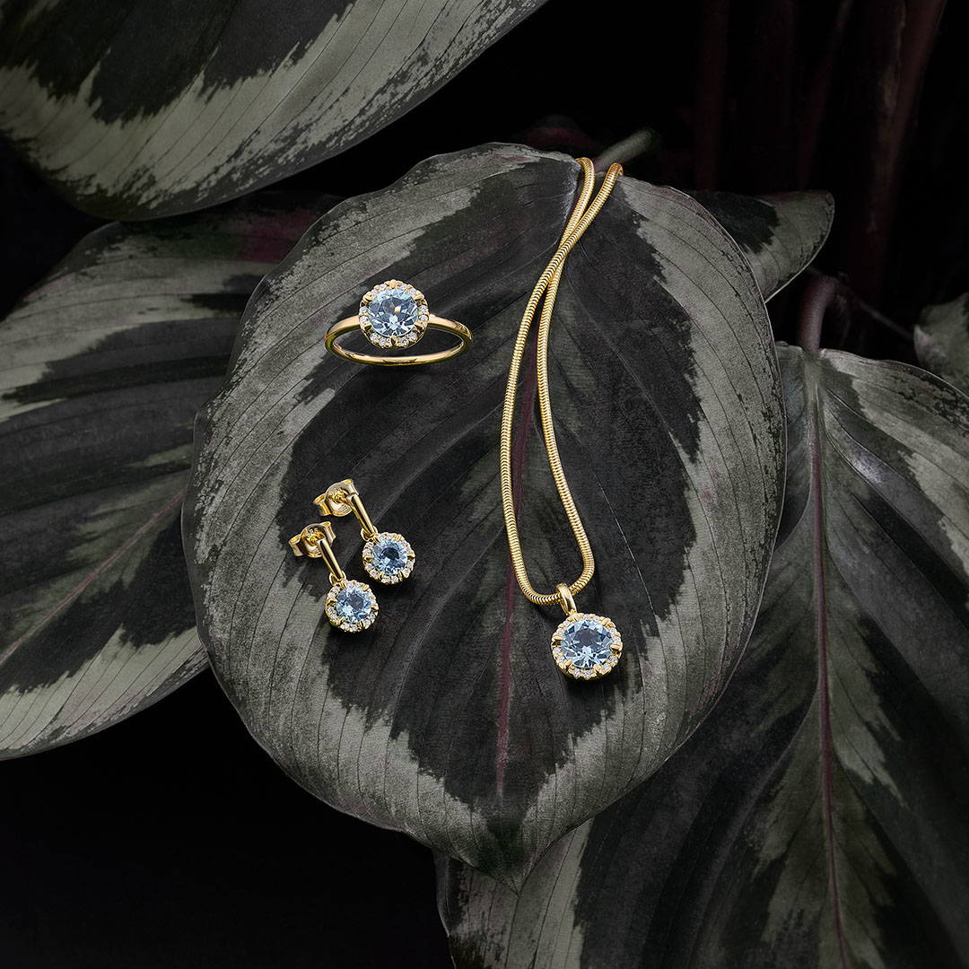 Anhänger 585/- Gelbgold Blautopas und  Brillant 0,08 ct.